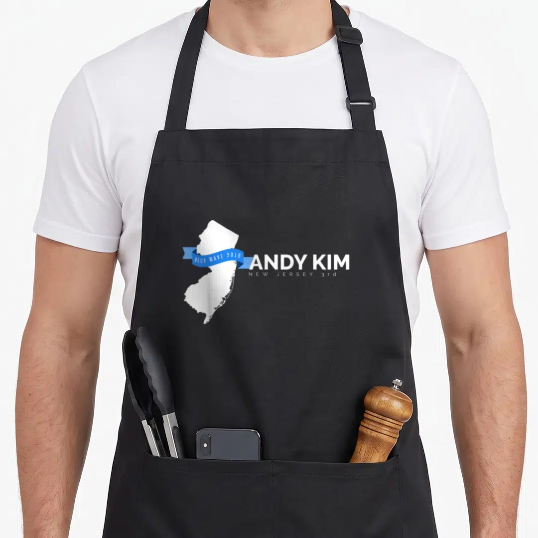 Andy midterms apron - White NJ map with blue ribbon reading Blue Wave 2018 Andy Kim New Jersey 3rd — shown on a black cotton canvas apron against a white background