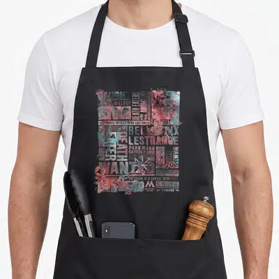 Most eater apron - Bellatrix Lestrange Lucius Malfoy wanted notices dark mark greyback werewolf distressed text collage — shown on a black cotton canvas apron against a white background