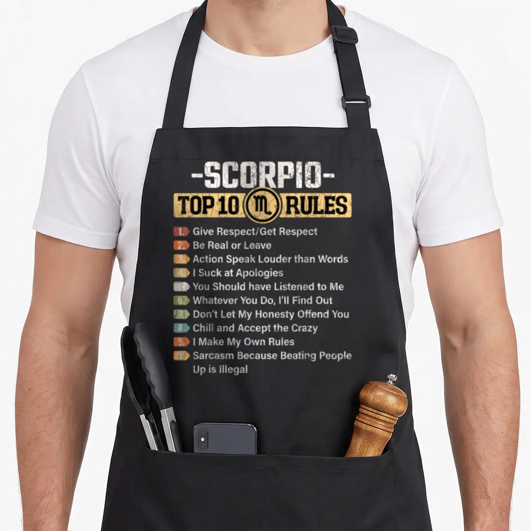 Rule zodiac aprons - -SCORPIO- Top 10 Rules list with yellow banner and numbered points in white and black text — shown on a black cotton canvas apron against a white background