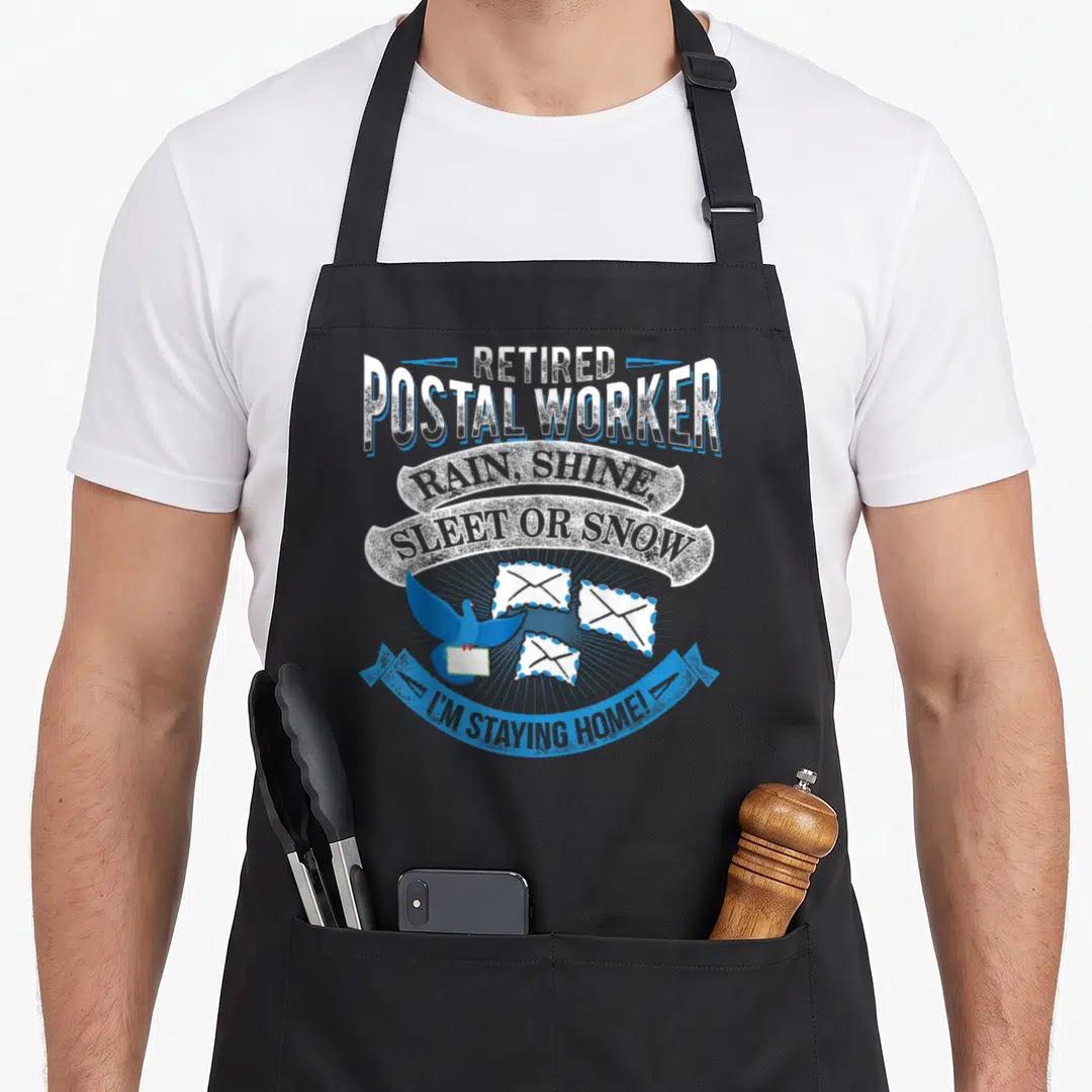 Snow postal aprons - Distressed text banners above blue bird holding envelope and three floating letters on black apron — shown on a black cotton canvas apron against a white background