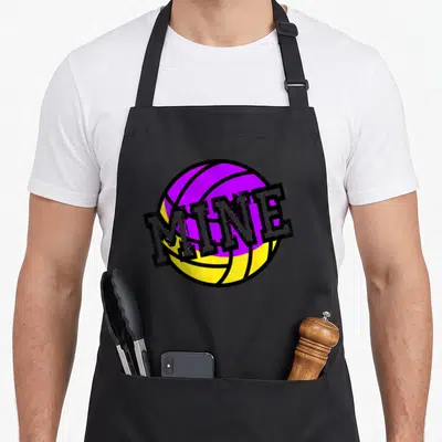 Mine game aprons - Purple and yellow volleyball with distressed MINE text overlay — shown on a black cotton canvas apron against a white background
