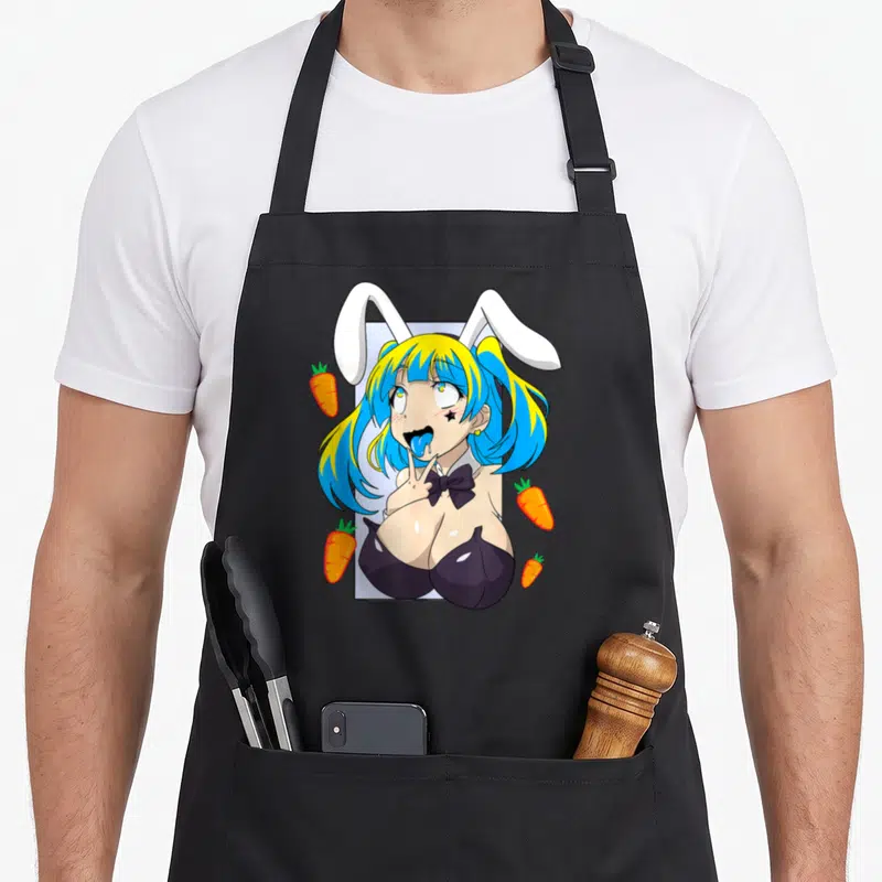 Ahegao anime apron - Cartoon girl with blue hair white bunny ears four orange carrots light blue rectangle — shown on a black cotton canvas apron against a white background