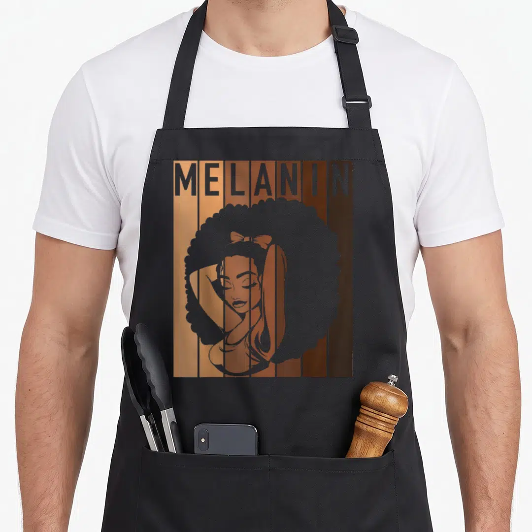 Melanin mom and daughter christmas aprons - Grey MELANIN text above a woman with an afro over brown and tan vertical — shown on a black cotton canvas apron against a white background