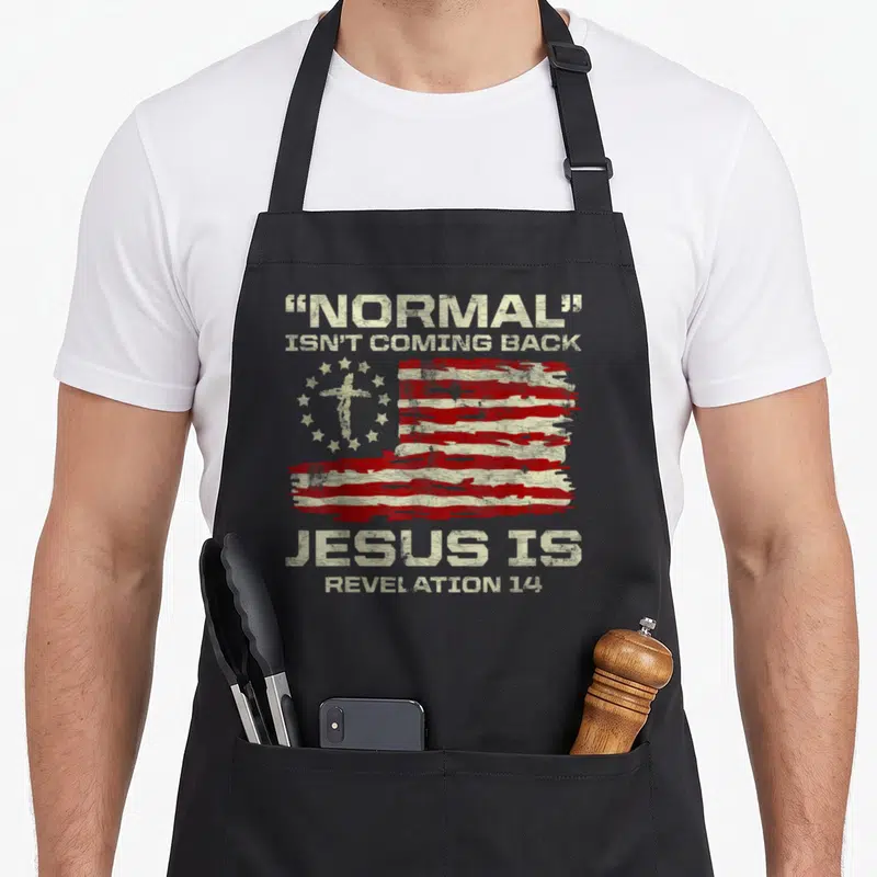 Normal american flag apron - Distressed US flag with cross and stars surrounded by beige text reading Normal Isn't — shown on a black cotton canvas apron against a white background