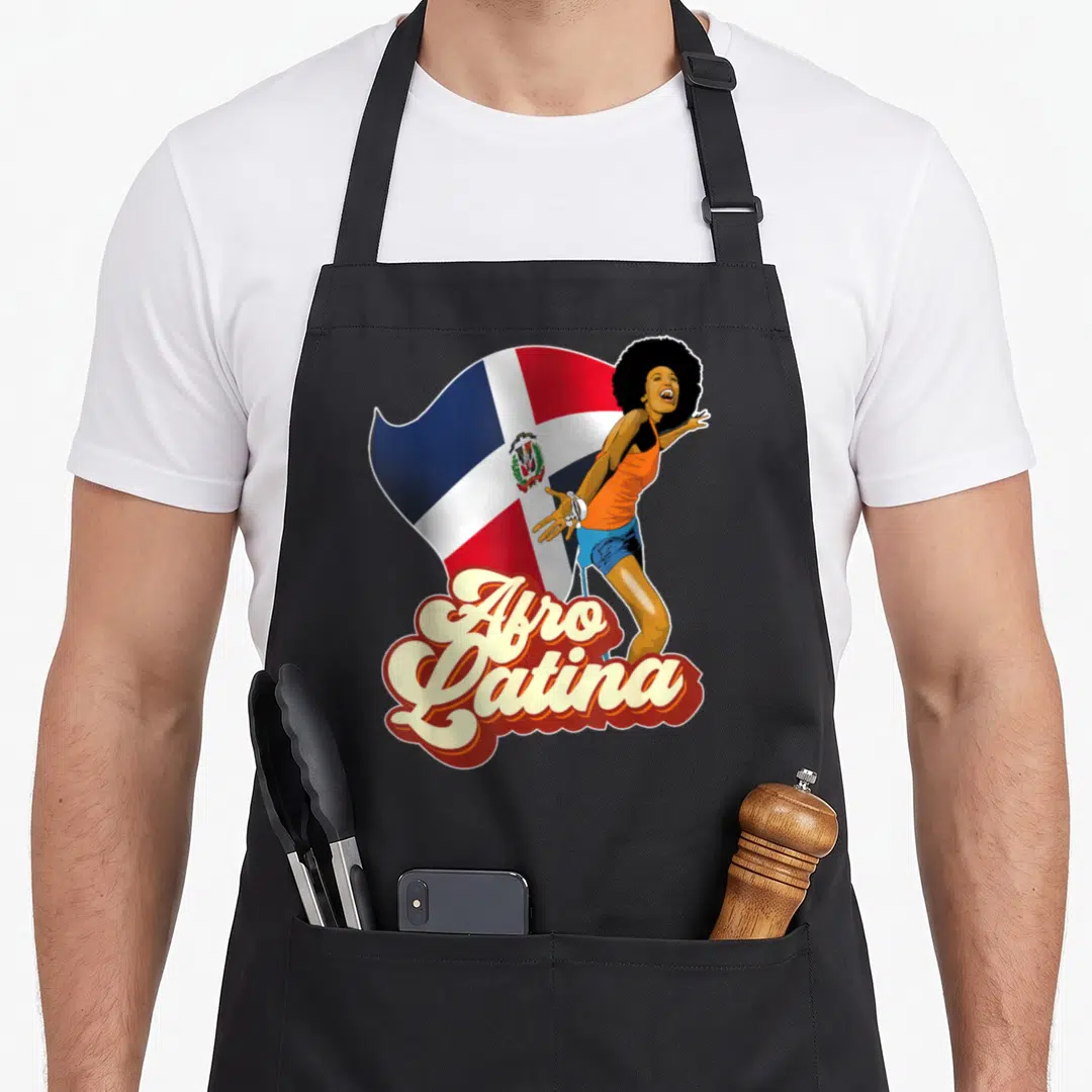 Afro latin apron - Cartoon woman with afro over Dominican flag, text Afro Latina — shown on a black cotton canvas apron against a white background