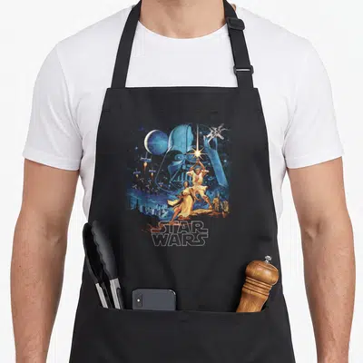 Hope light novel apron - Blue Darth Vader silhouette with gold characters and white Star Wars text — shown on a black cotton canvas apron against a white background