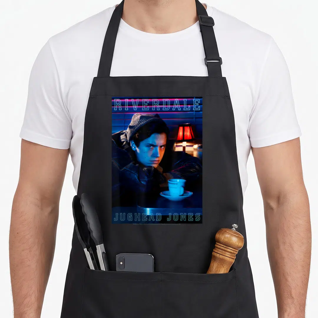 Riverdale modern apron - Jughead Jones portrait with coffee cup and lamp in blue red black neon style — shown on a black cotton canvas apron against a white background