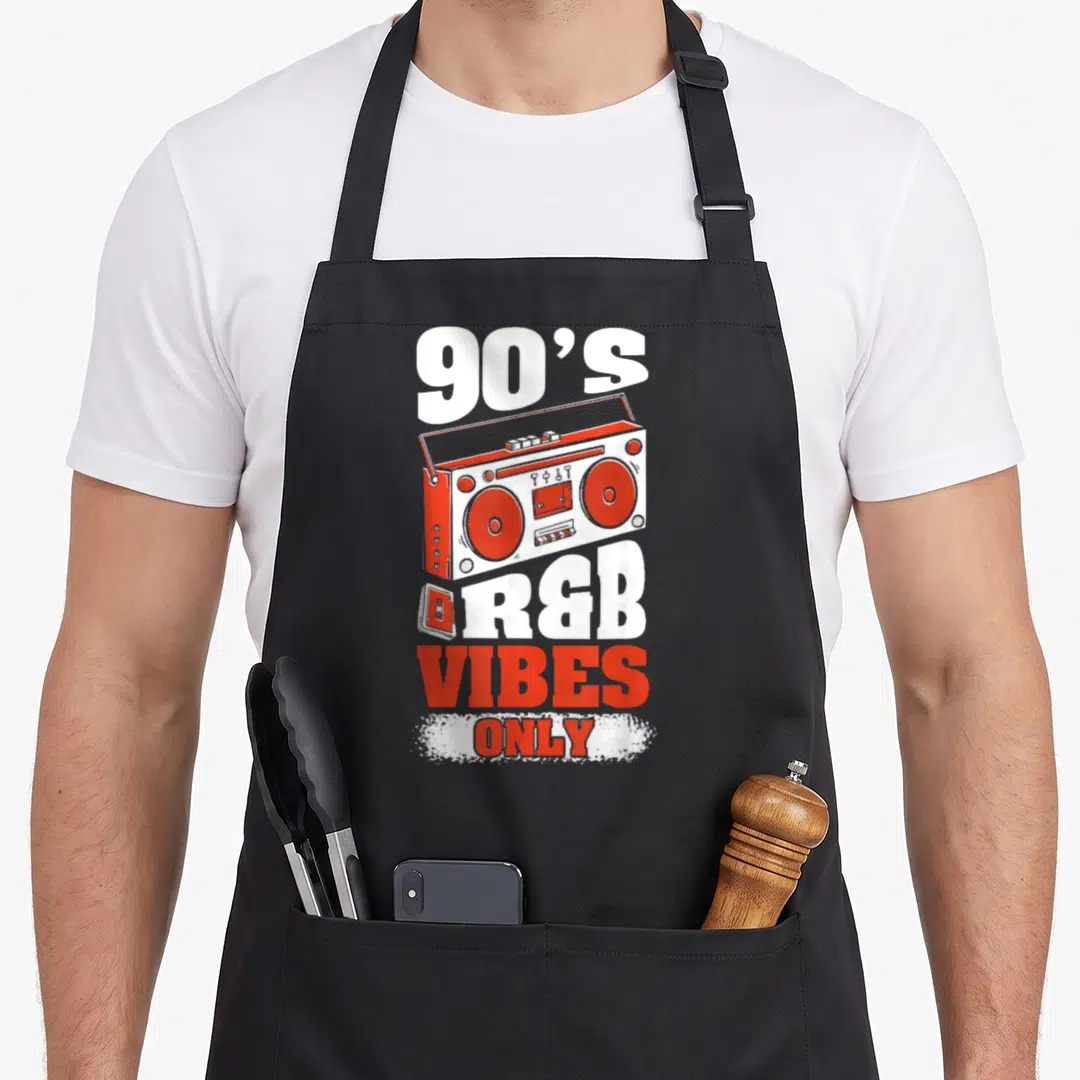 Hiphop r aprons - Red and white cartoon boombox with 90s R&B Vibes Only text and cassette tape graphic — shown on a black cotton canvas apron against a white background