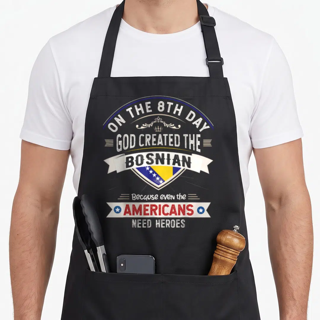 Souvenir bosnian apron - Retro badge with On the 8th Day text and Bosnian flag shield in white blue yellow red — shown on a black cotton canvas apron against a white background