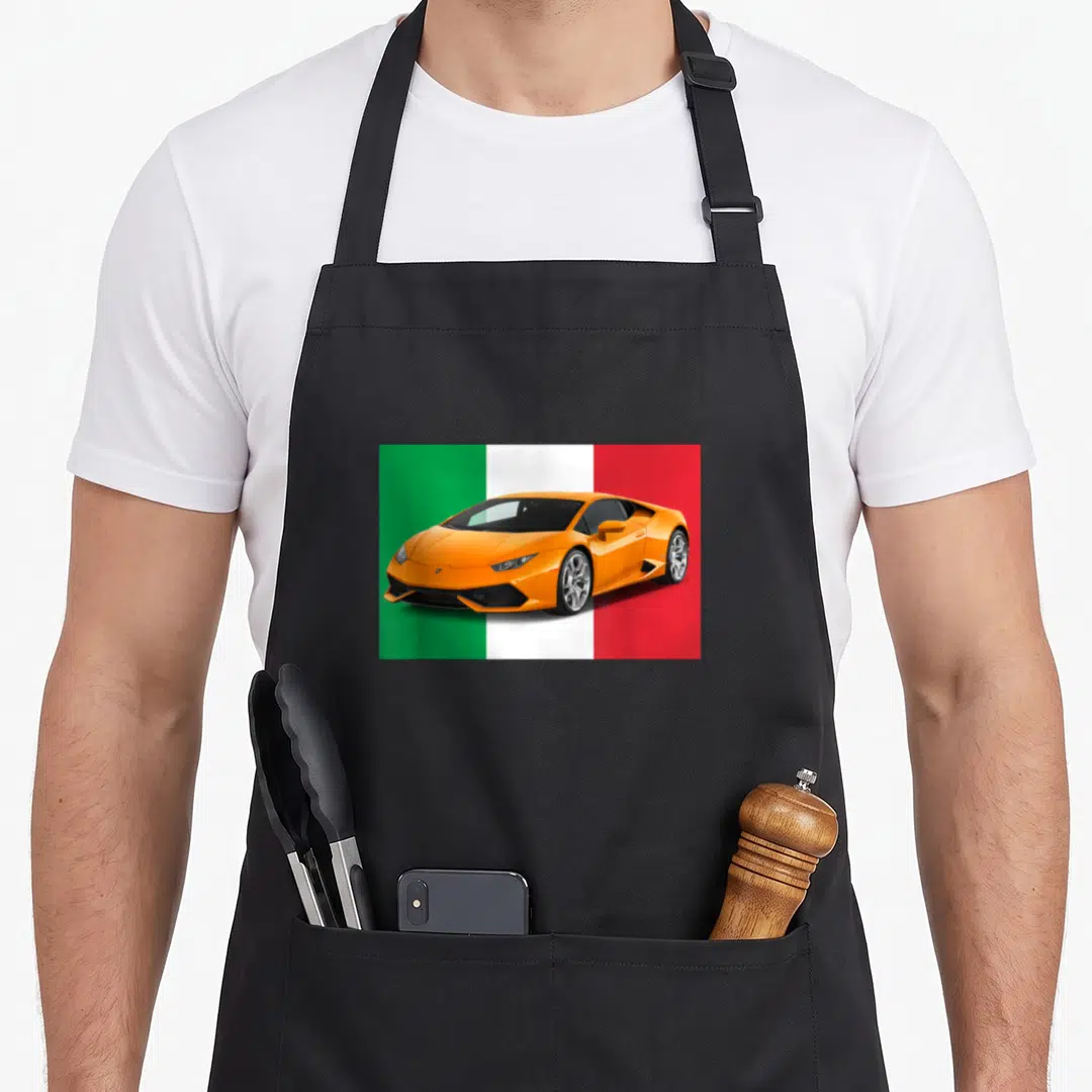 Supercar italian apron - Orange sports car centered on green white and red Italian flag background — shown on a black cotton canvas apron against a white background