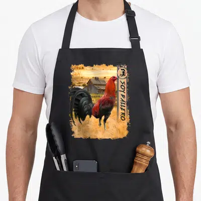Gallero rooster apron - Photo of red and black rooster in field with vertical Soy Allero banner — shown on a black cotton canvas apron against a white background
