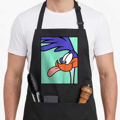 Funny runner road apron - Cartoon Road Runner head and neck in blue orange on mint green background with black border — shown on a black cotton canvas apron against a white background