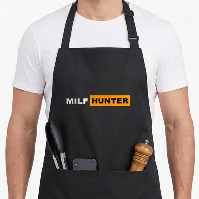 Milf hunter apron - MILF HUNTER text in white and orange block letters on grey background — shown on a black cotton canvas apron against a white background
