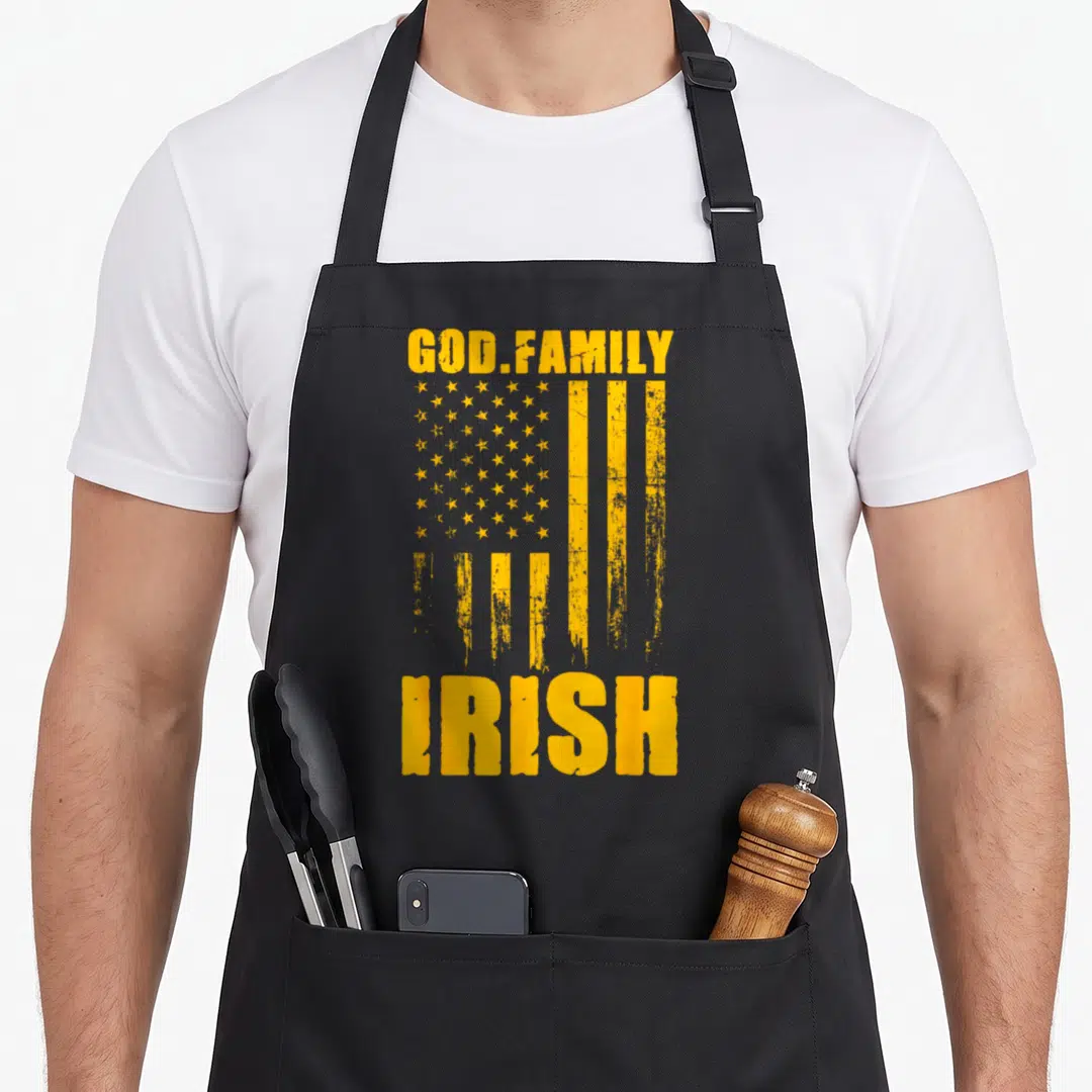 God family aprons - Yellow distressed USA flag with God Family Irish text — shown on a black cotton canvas apron against a white background