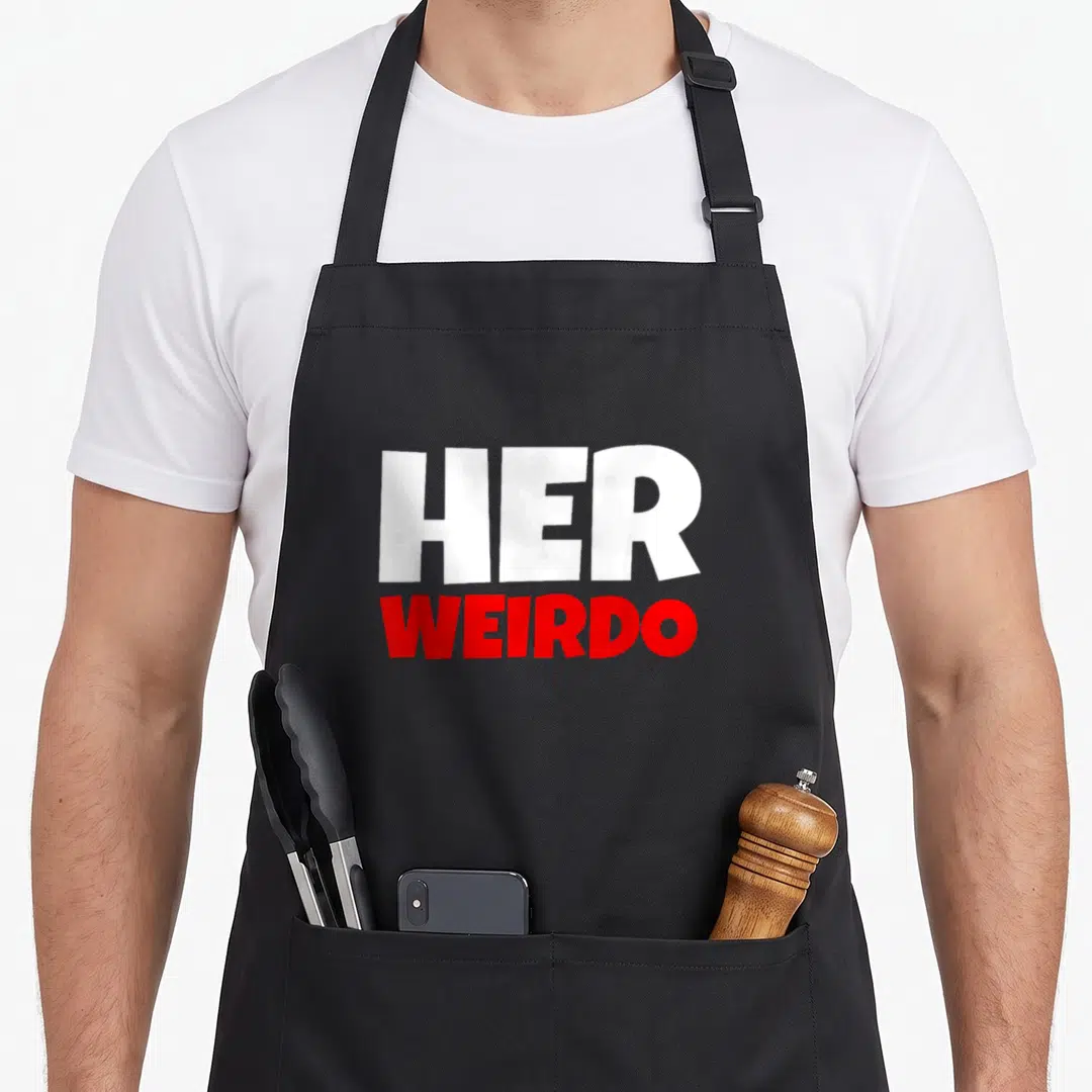 Weirdo couple apron - Stacked white HER and red WEIRDO text on grey background — shown on a black cotton canvas apron against a white background