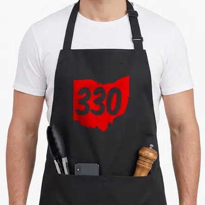 Akron youngstown apron - Red Ohio state silhouette with grey 330 number centered on front panel — shown on a black cotton canvas apron against a white background