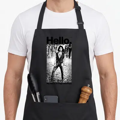 Bride hello princess apron - Black and white photo of Inigo Montoya with Hello text and sword hilt visible — shown on a black cotton canvas apron against a white background