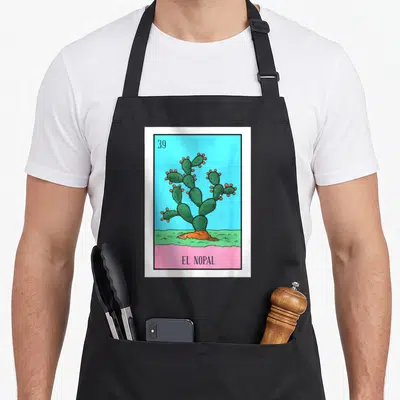 Nopal cactus apron - Card 39 El Nopal cactus illustration on blue and pink background — shown on a black cotton canvas apron against a white background