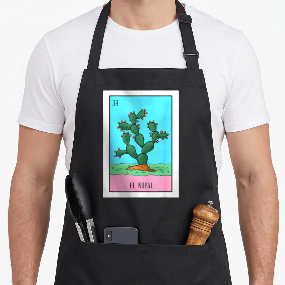 Nopal cactus apron - Card 39 El Nopal cactus illustration on blue and pink background — shown on a black cotton canvas apron against a white background