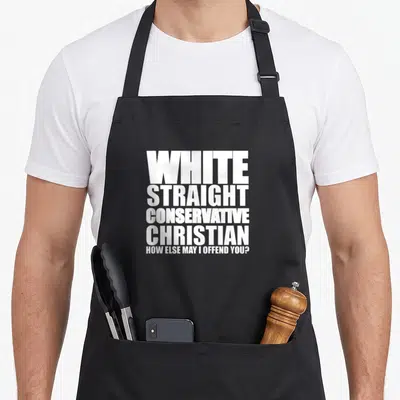 Conservative christian apron - White stacked text reading White Straight Conservative Christian How Else May I Offend — shown on a black cotton canvas apron against a white background