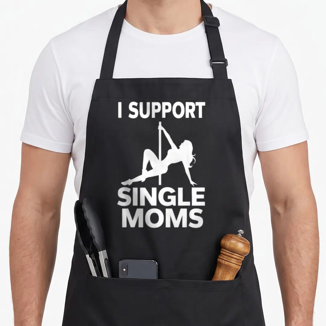 Trash inappropriate humor co apron - White I Support Single Moms text with pole dancer silhouette — shown on a black cotton canvas apron against a white background