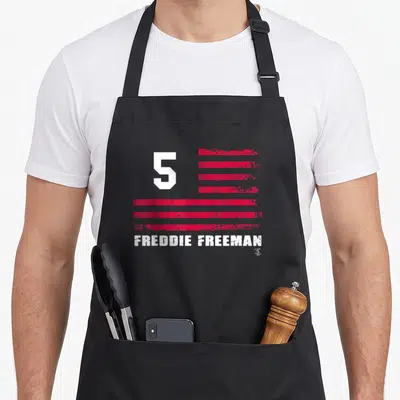 Fanprint baseball fan apron - White number 5 and red horizontal stripes above name in distressed style — shown on a black cotton canvas apron against a white background
