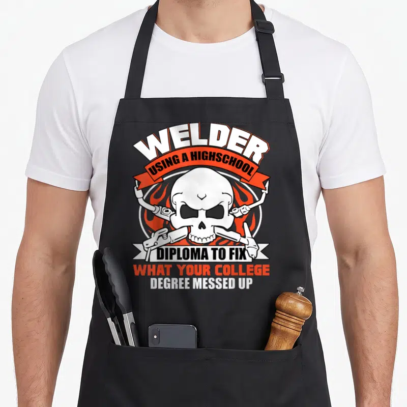 Using diploma apron - Skull crossed welding torches text Welder Using Highschool Diploma Fix College Degree Messed Up — shown on a black cotton canvas apron against a white background