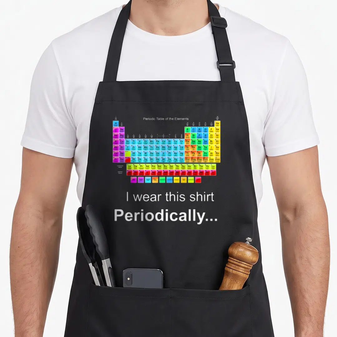 Periodically periodic table apron - Colorful periodic table chart with white text I wear this shirt Periodically below — shown on a black cotton canvas apron against a white background