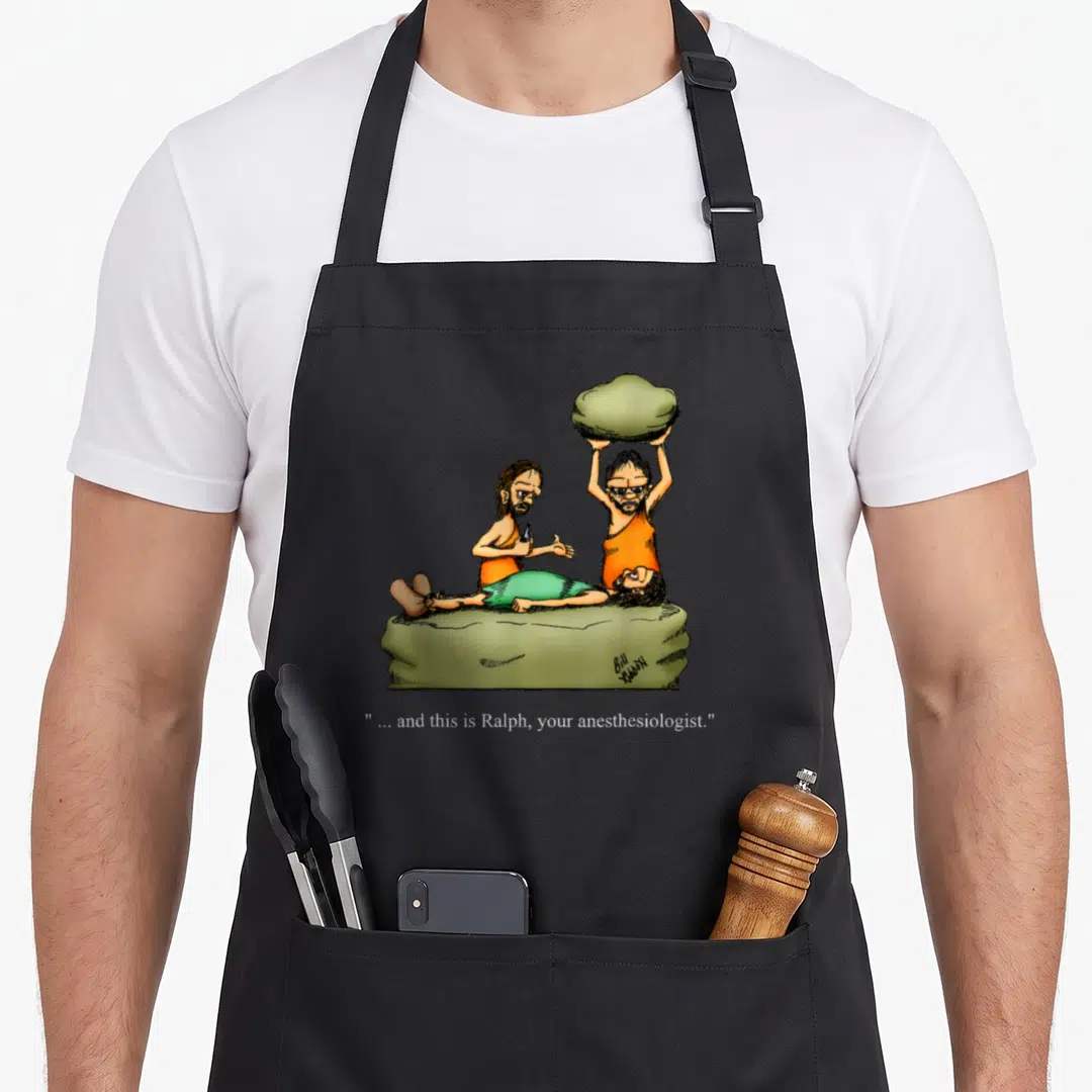 Caveman cartoon apron - Three cavemen on a slab, one holds a rock, caption reads and this is Ralph your anesthesiologist — shown on a black cotton canvas apron against a white background