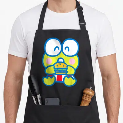Keroppi white river apron - Lime green monster with white eyes and pink cheeks holding hamburger in blue cartoon outline — shown on a black cotton canvas apron against a white background