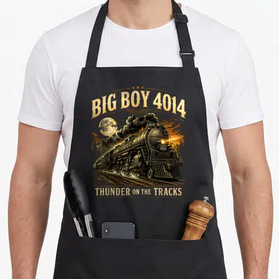 Funny steam locomotive apron - Big Boy 4014 steam locomotive with moon and gold lettering — shown on a black cotton canvas apron against a white background