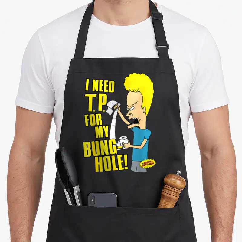 Beavis dad mode apron - Beavis holding toilet paper with stacked yellow text I NEED T.P. FOR MY BUNG-HOLE — shown on a black cotton canvas apron against a white background