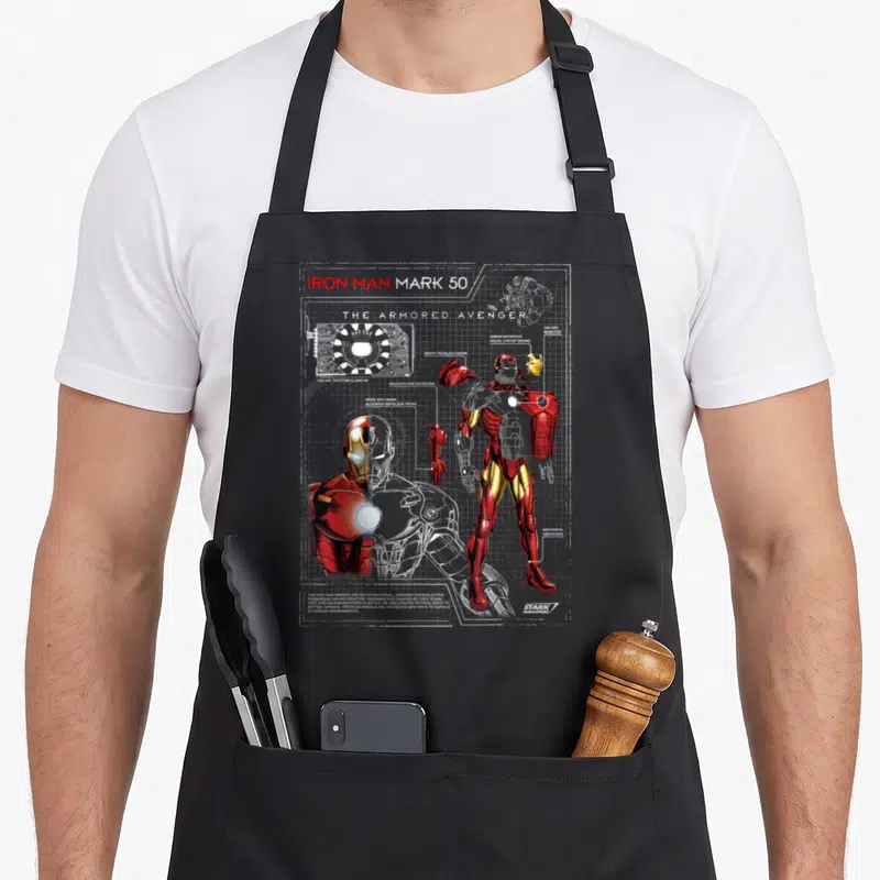 Armor ironman apron - Iron Man Mark 50 schematic with red gold armor labels and circuit board details — shown on a black cotton canvas apron against a white background