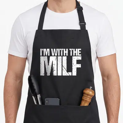 Milf husband apron - White distressed stacked text reading I'M WITH THE MILF on dark background — shown on a black cotton canvas apron against a white background