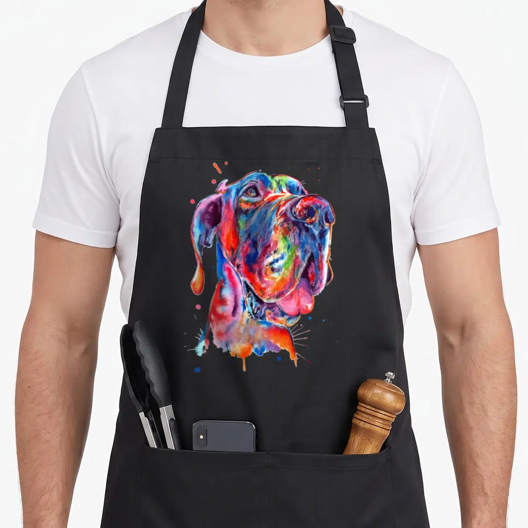 Funny dane splash aprons - Multicolored watercolor dog head portrait with blue red yellow pink orange splatters — shown on a black cotton canvas apron against a white background