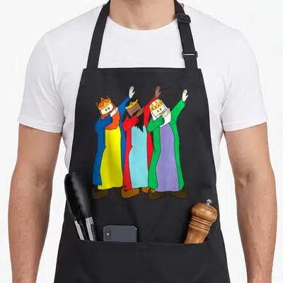 Three king apron - Three cartoon wise men in colorful robes and crowns performing the dab dance pose — shown on a black cotton canvas apron against a white background