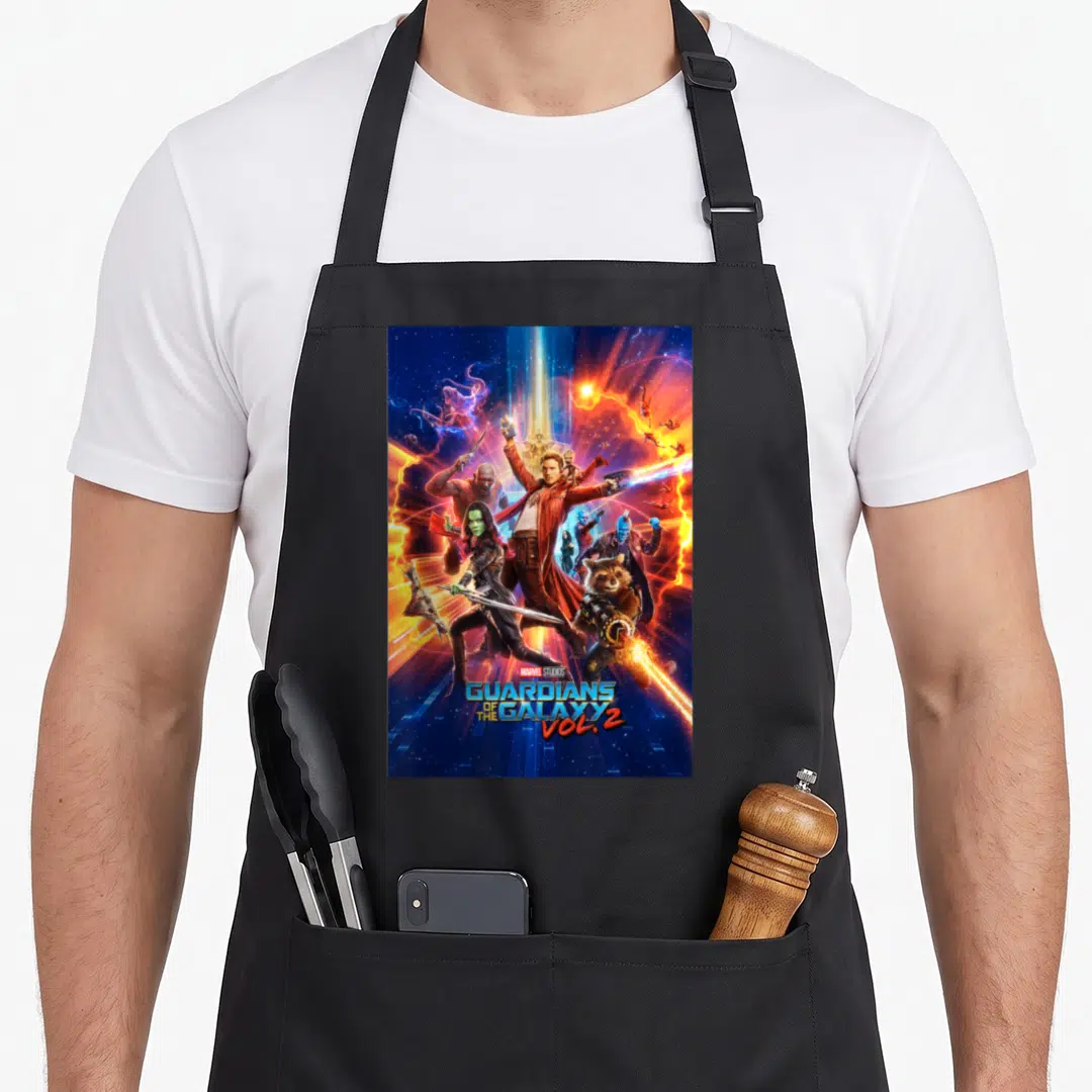 Studio guardian galaxy apron - Guardians of the Galaxy Vol 2 movie poster with characters in blue orange red yellow — shown on a black cotton canvas apron against a white background