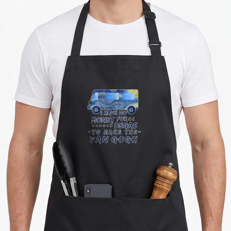 Monet van gogh apron - Van with Starry Night pattern and text I HAVE NO MONET FOR DEGAS — shown on a black cotton canvas apron against a white background