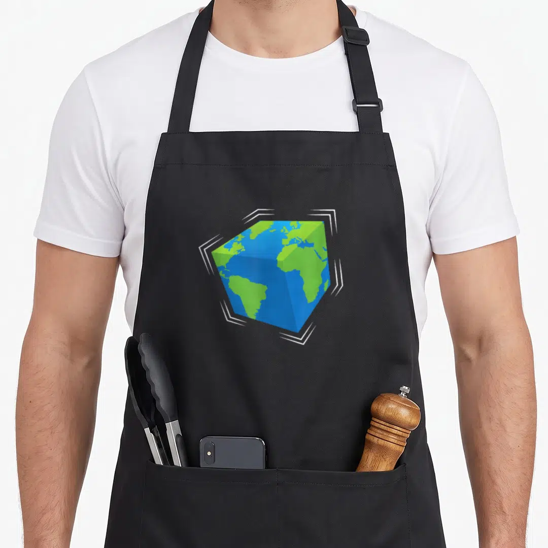Planet a's aprons - Blue and green earth rendered as a cube inside four white corner brackets on a black background — shown on a black cotton canvas apron against a white background