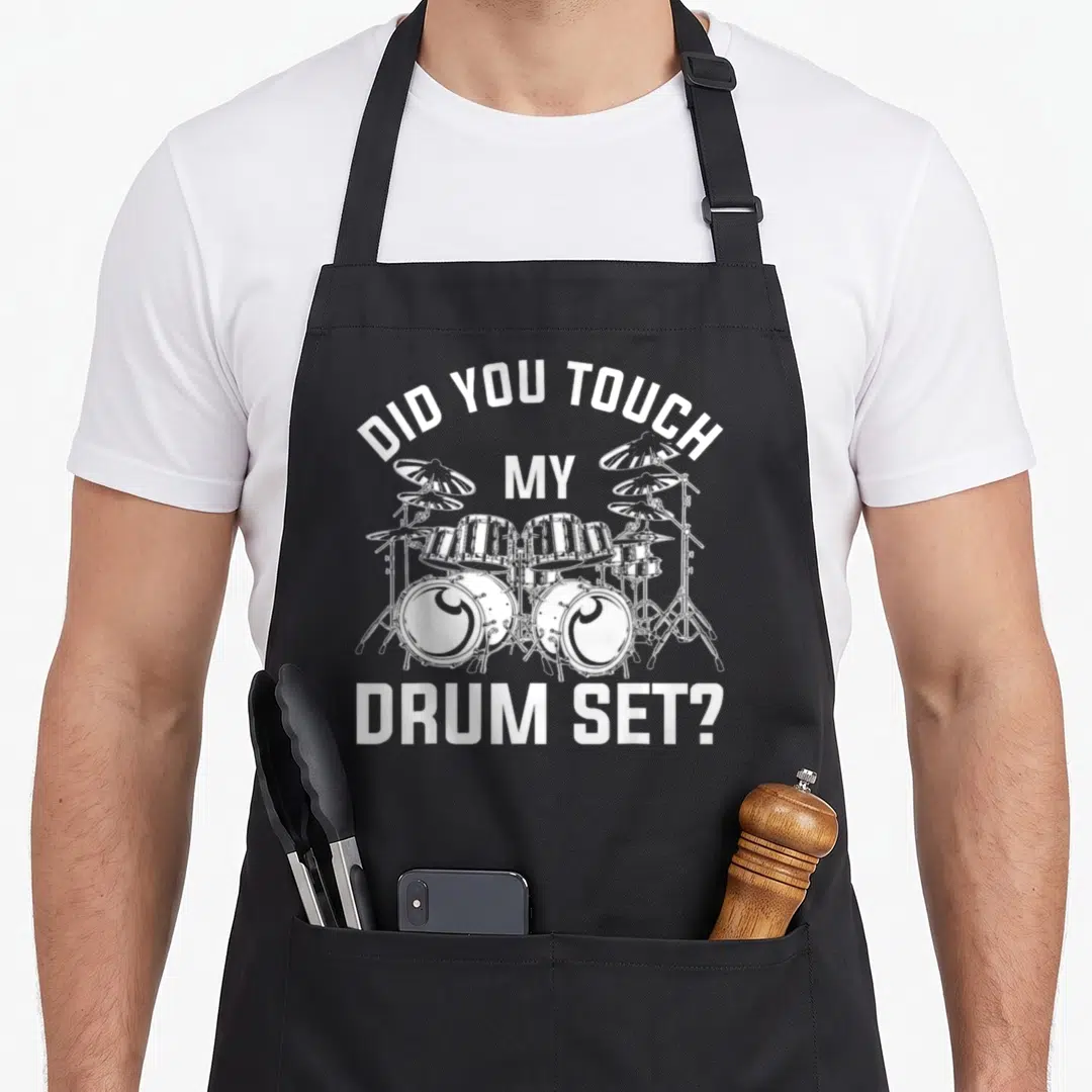Rock drum apron - White distressed text Did You Touch My Drum Set surrounding a drum kit illustration — shown on a black cotton canvas apron against a white background