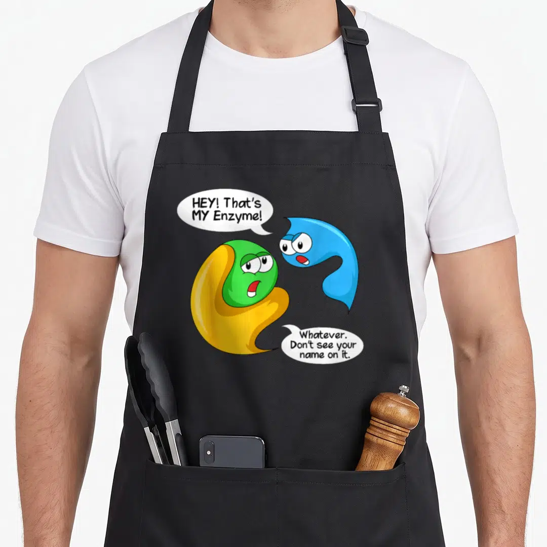 Nature science apron - Cartoon yellow enzyme and blue substrate with speech bubbles reading HEY That's MY Enzyme — shown on a black cotton canvas apron against a white background