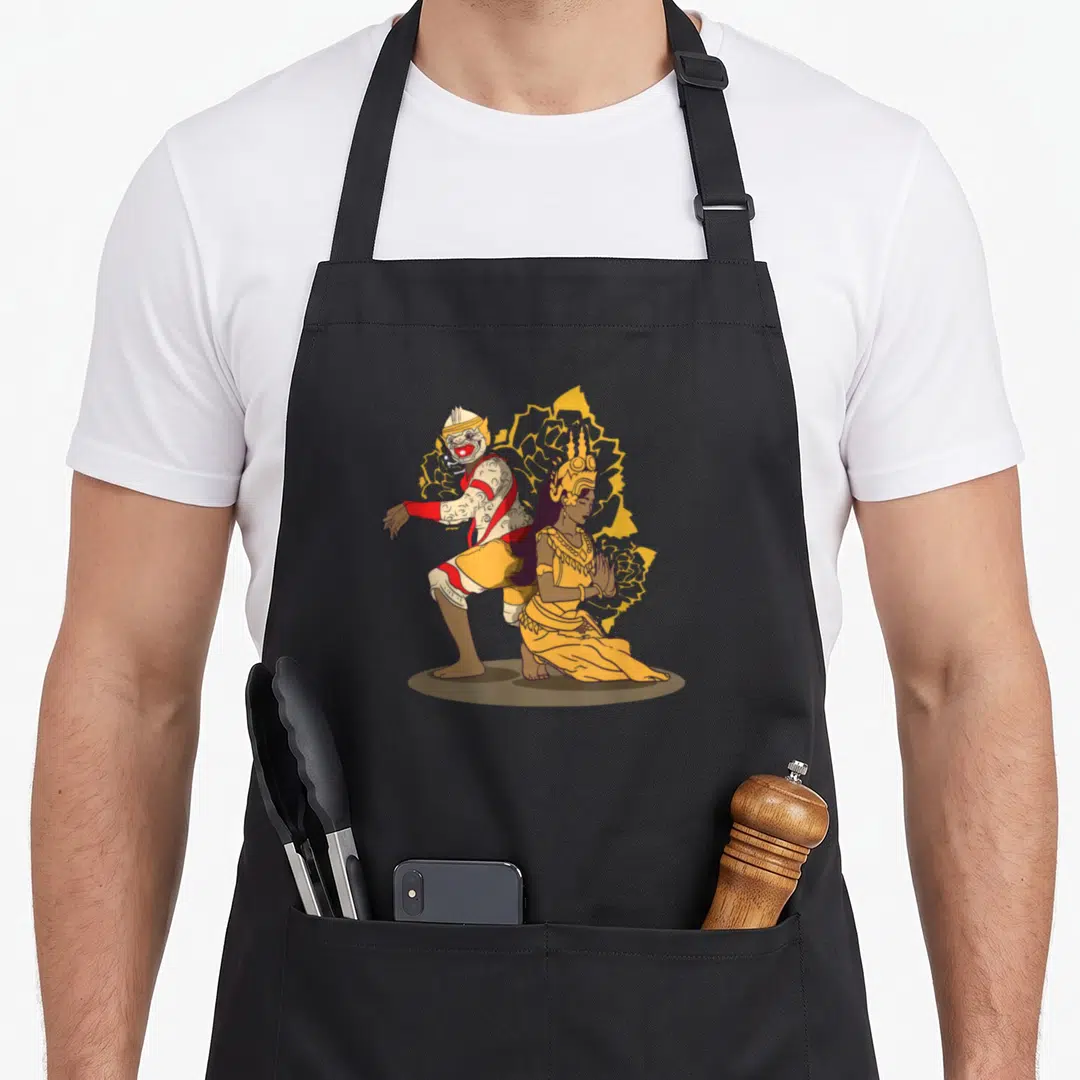 Khmer cambodian apron - Two cartoon dancers in yellow red and brown traditional attire against yellow background — shown on a black cotton canvas apron against a white background