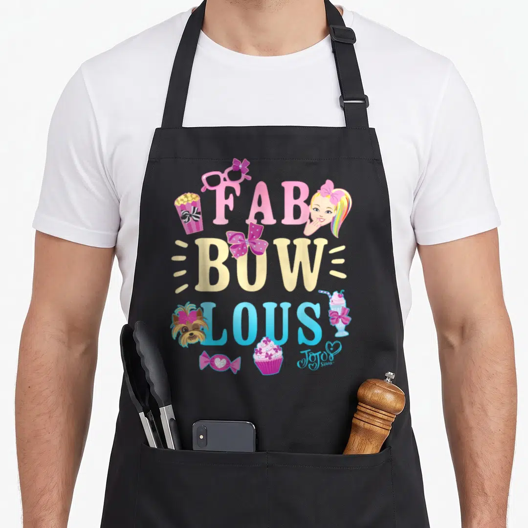 Fab bow apron - Stacked FAB BOW LOUS text with JoJo Siwa, dog, sunglasses, popcorn, milkshake, cupcake, candy, and bows — shown on a black cotton canvas apron against a white background