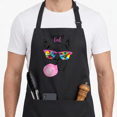 Llama rainbow apron - Line art llama head with pink sunglasses reflecting rainbow colors and blowing a pink bubble — shown on a black cotton canvas apron against a white background