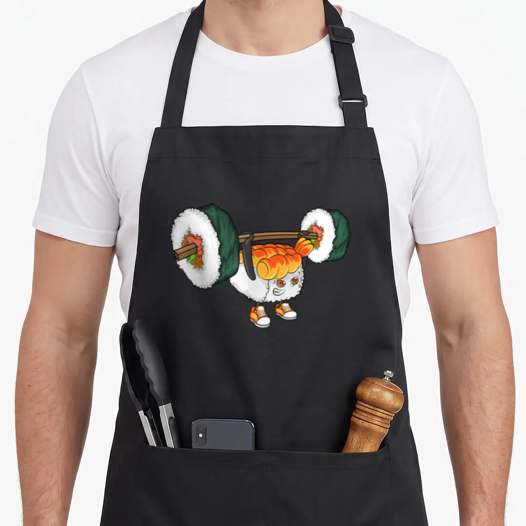 Weight sushi apron - Cartoon sushi character lifting a barbell made of large sushi rolls — shown on a black cotton canvas apron against a white background