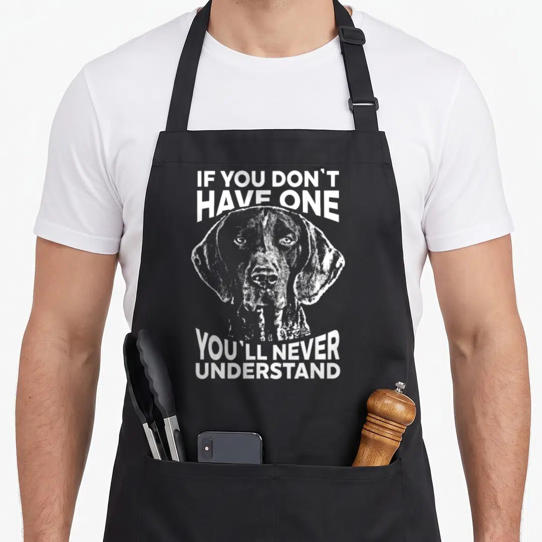 Funny shorthaired pointer apron - Distressed white dog head with arched text IF YOU DON'T HAVE ONE on grey background — shown on a black cotton canvas apron against a white background