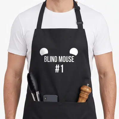 Costume three mice apron - White semi-circle mouse ears above stacked text reading BLIND MOUSE #1 — shown on a black cotton canvas apron against a white background