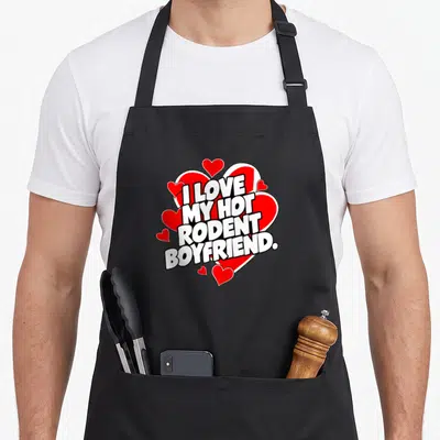 Retro hot i love my mouse apron - I LOVE MY HOT RODENT BOYFRIEND text over red cartoon hearts — shown on a black cotton canvas apron against a white background