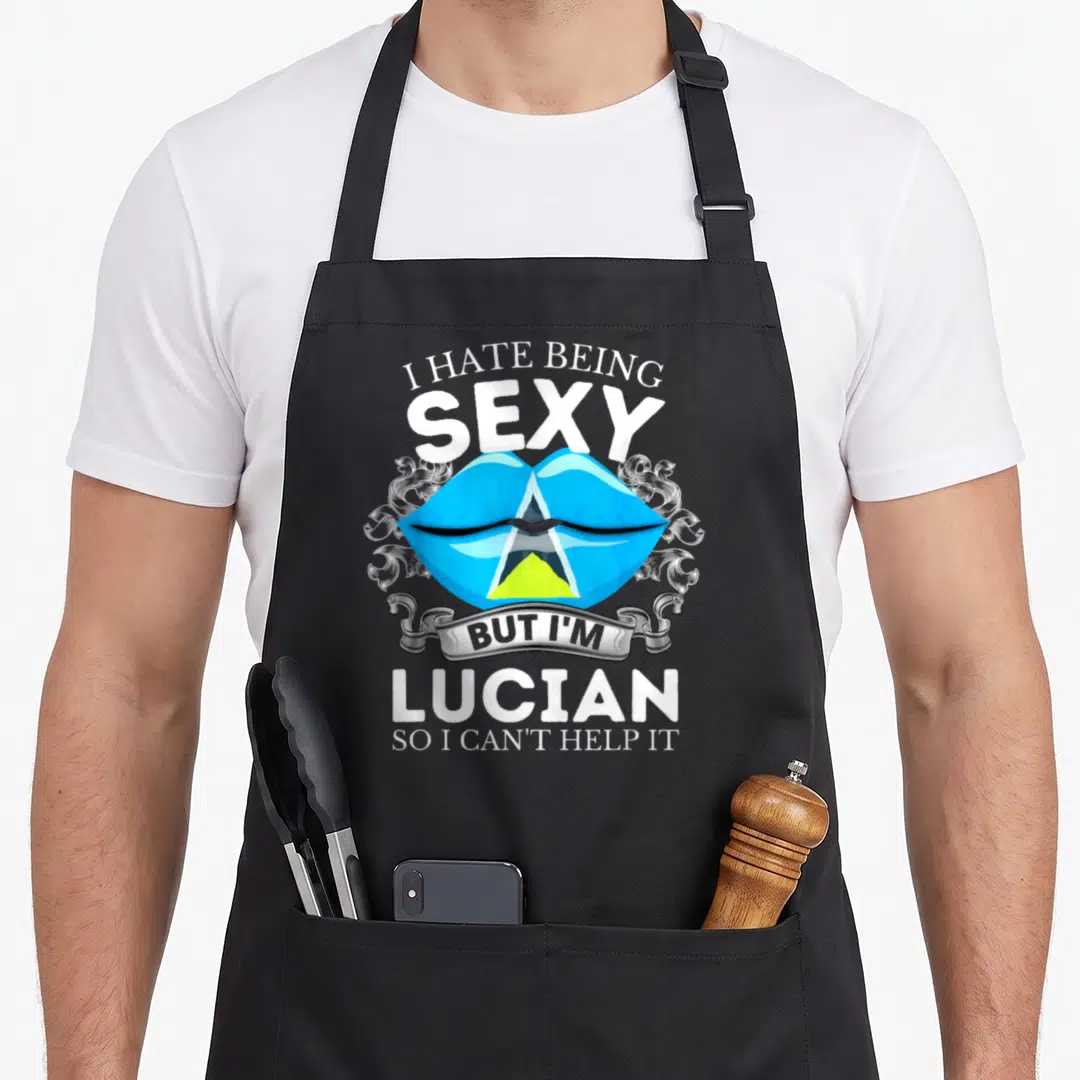 Saint patriotic apron - Cartoon blue lips with flag triangle and sarcastic text surrounded by filigree — shown on a black cotton canvas apron against a white background