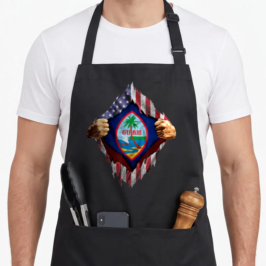 Seal flag guam aprons - Two hands rip a distressed USA flag to reveal the Guam flag and red GUAM text — shown on a black cotton canvas apron against a white background